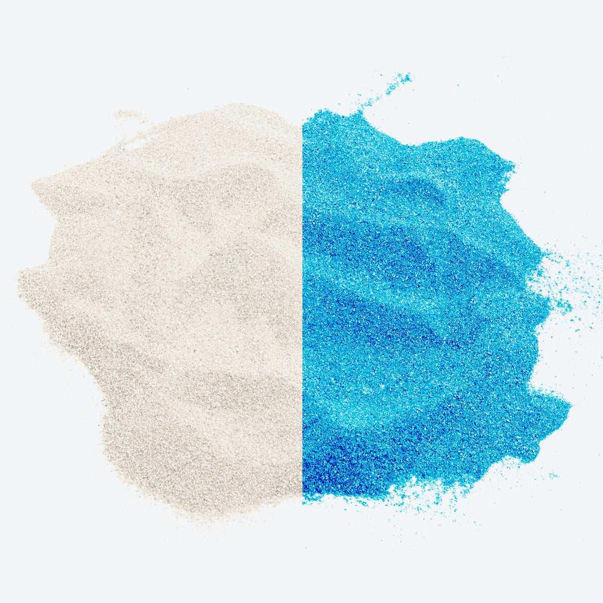 Sky Blue Aura Glow Sand, half white as it looks in daylight and half bright blue as it glows
